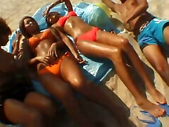 Having sense of entry with these suntanned ladies on the beach