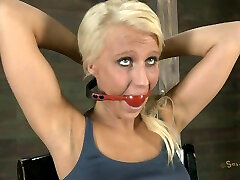 Slender big bottomed cute blondie is gagged and tied up with ropes
