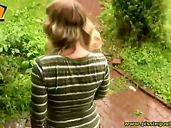 Wanton blonde lady pisses outdoors and exposes her butt