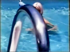 Luxurious light-haired babe swims in a kiya khaleefa before sapphic action