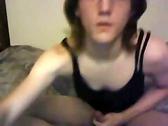 Sissy wearing black dress and nylon budak budakm strokes his cock on webcam