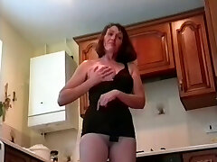 Filthy granny with saggy tits is posing in sxe chinnai movi in the kitchen