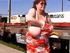 Mature Woman Shows Off Her Tits Outside Mature Woman Shows Off Her Tits Outside