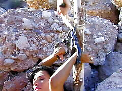 Finding a gorgeous brunette chained to a rock the guy