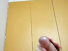 A young but very handsome guy plays catch-up with his cute cock