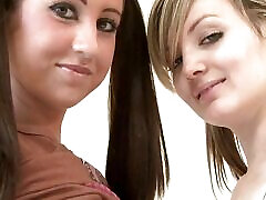 Two gorgeous lovely babes touch each other seductively for your pleasure
