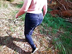 Walking film po through forest while slapping her tits