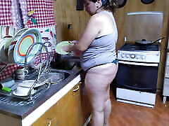 Mom cleans her kitchen