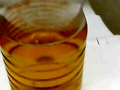 Peeing into glass and plastic bottles