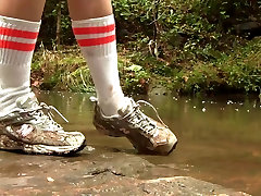 Caroline New Balance sneaker hike with mud and water preview