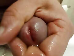 morning stron pee and foreskin play. Extreme close up.