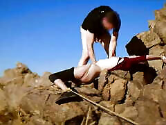 Piss, pussy fucking, and pain on the hard rocks for submissive Brooke Johnson