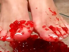 A brunette German slut gets her feet messy before getting fucked