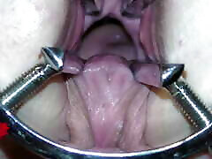 The mistress&039; cunt is opened with a hole expander so that you can study her cervix.
