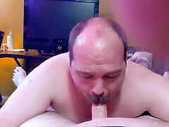 Handsome moustache daddy gives hot blowjob to bubba bear&039;s chubby cock and gets a fat load of cum in return