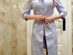 nurse in the hospital toilet masturbates and makes a video on the tall big tit women for her subscribers