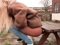 Outdoors video of dirty Kiara Lord posing and pissing in her jeans