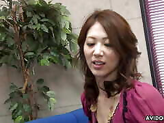 Japanese brunette Riko Miyase sucks and licks three cocks uncensored.