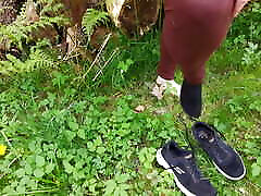 Get undressed and lie down on the tree trunk for pussy slapping