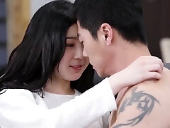 Japanese couple having sex on a bed