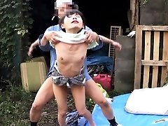 Cocksucking asian outdoors in threesome fucked