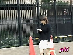 Diminutive tempting oriental chick flashes her blue panties in hot sharking video