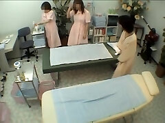 Asian milf is getting an erotic voyeur rubdown in a hotel