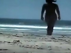 Nude couple at the beach