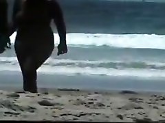 Nude couple at the beach