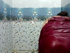 Indian young bhabhi bathing in petticoat tub