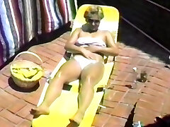 Homemade video of a solo chick wearing nylon stocking having fun