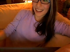 girl in glasses shoots a load