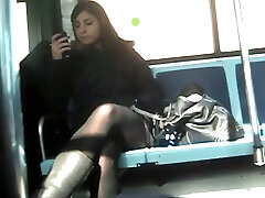 Voyeur video from public bus - brunette chick in dark-hued pantyhose