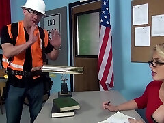 Ash-blonde with glasses letting the clean-shaved geezer bang her in the classroom