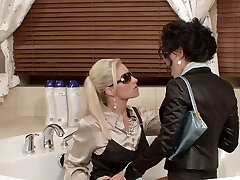 Ash-blonde and the dark-haired babe having a fine time in the bathtub