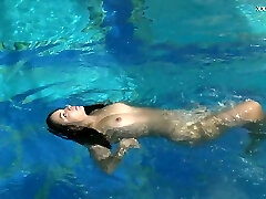 Sexy mermaid Puzan Bruhova performs her hot underwater showcase