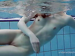 White bathing suit with tattoos babe Roxalana Cheh underwater