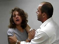 Policeman searches with his mitt in her vagina