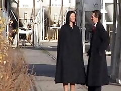 Tormentor whips two hot submissive girls in a dungeon