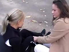 Handsome blonde and dark black haired lesbians