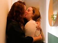 Curly redhead squirts during lesbian finger romping