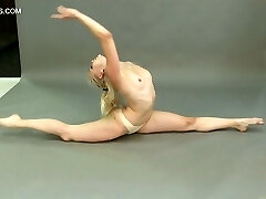 Flexible teen Dora Tornaszkova gets bare and flash ninnies in different positions