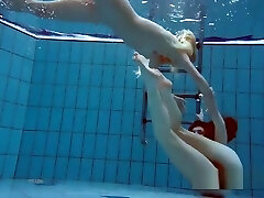 Milana And Katrin Strip Eachother Underwater