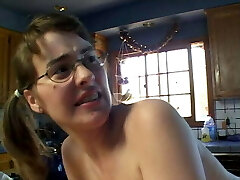 Hot young dark haired takes a load on her glasses after getting screwed