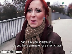 Czech redhead is paid cash to demonstrate and suck bone in public