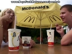 Mature bends over for rear end fuck in public