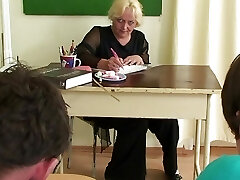 Two studs bang aged blonde teacher from both ends