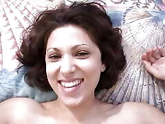 Amazing brunette with big tits pleases her man