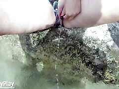 Outdoor pee hole insertion with piss in water
