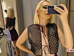 Trying on completely transparent clothes in the fitting room. Look at my boobs in a public place.